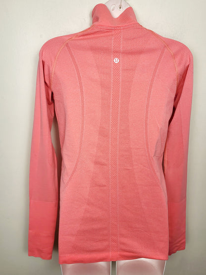 Lululemon Swiftly Tech 1/2 Zip in "Heathered Alarming" colour. Size 4