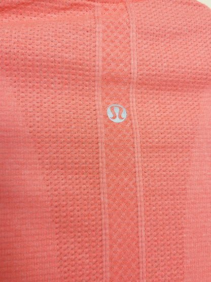 Lululemon Swiftly Tech 1/2 Zip in "Heathered Alarming" colour. Size 4