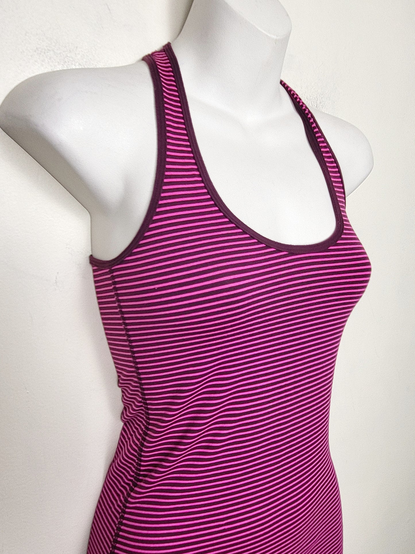 Lululemon striped racerback tank top. Sizes like a small