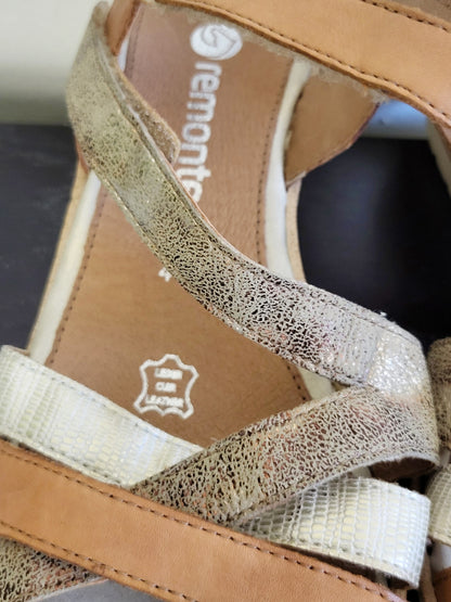 Remonte Tan/Gold criss-cross wedge sandals. Size 41 (US size 10)