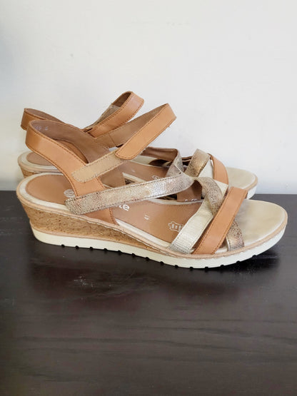 Remonte Tan/Gold criss-cross wedge sandals. Size 41 (US size 10)