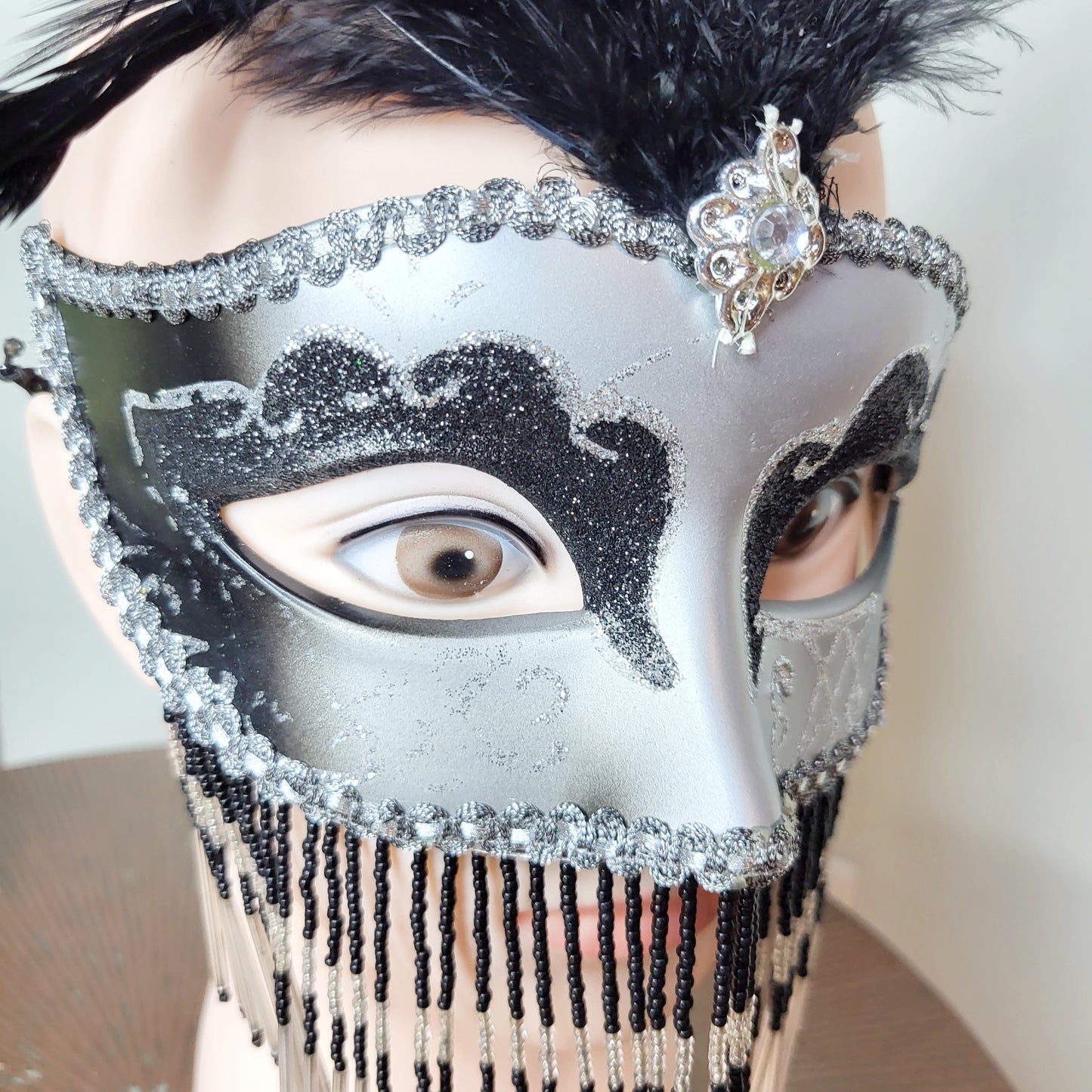 REWNDZ - Black and silver masquerade mask with feathers, minor flaws