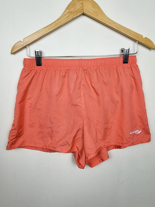 Saucony coral pink running shorts | Size MEDIUM