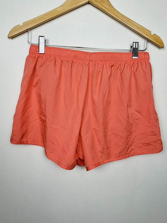 Saucony coral pink running shorts | Size MEDIUM