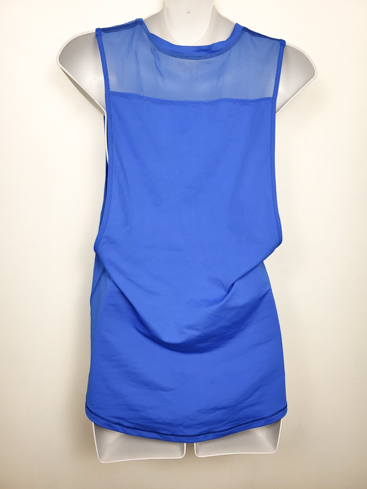 Lululemon blue loose fit athletic tank with mesh accents. Sizes like a 4