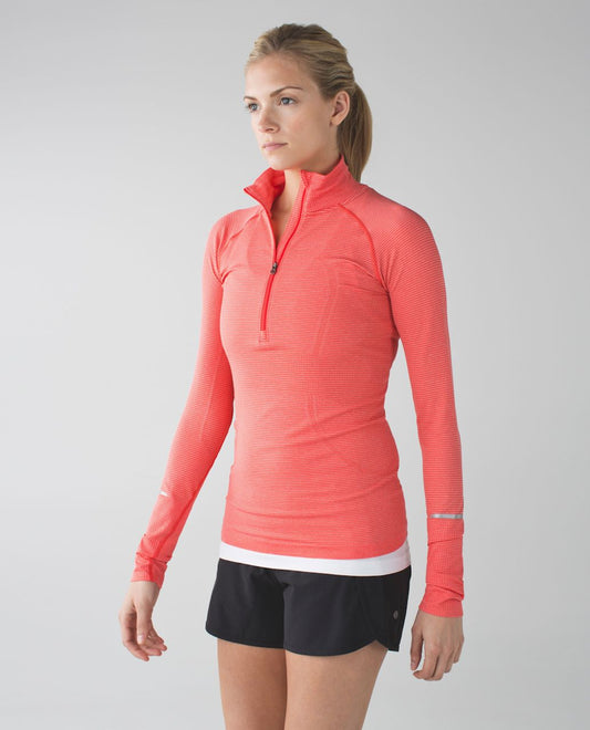 Lululemon Swiftly Tech 1/2 Zip in "Heathered Alarming" colour. Size 4